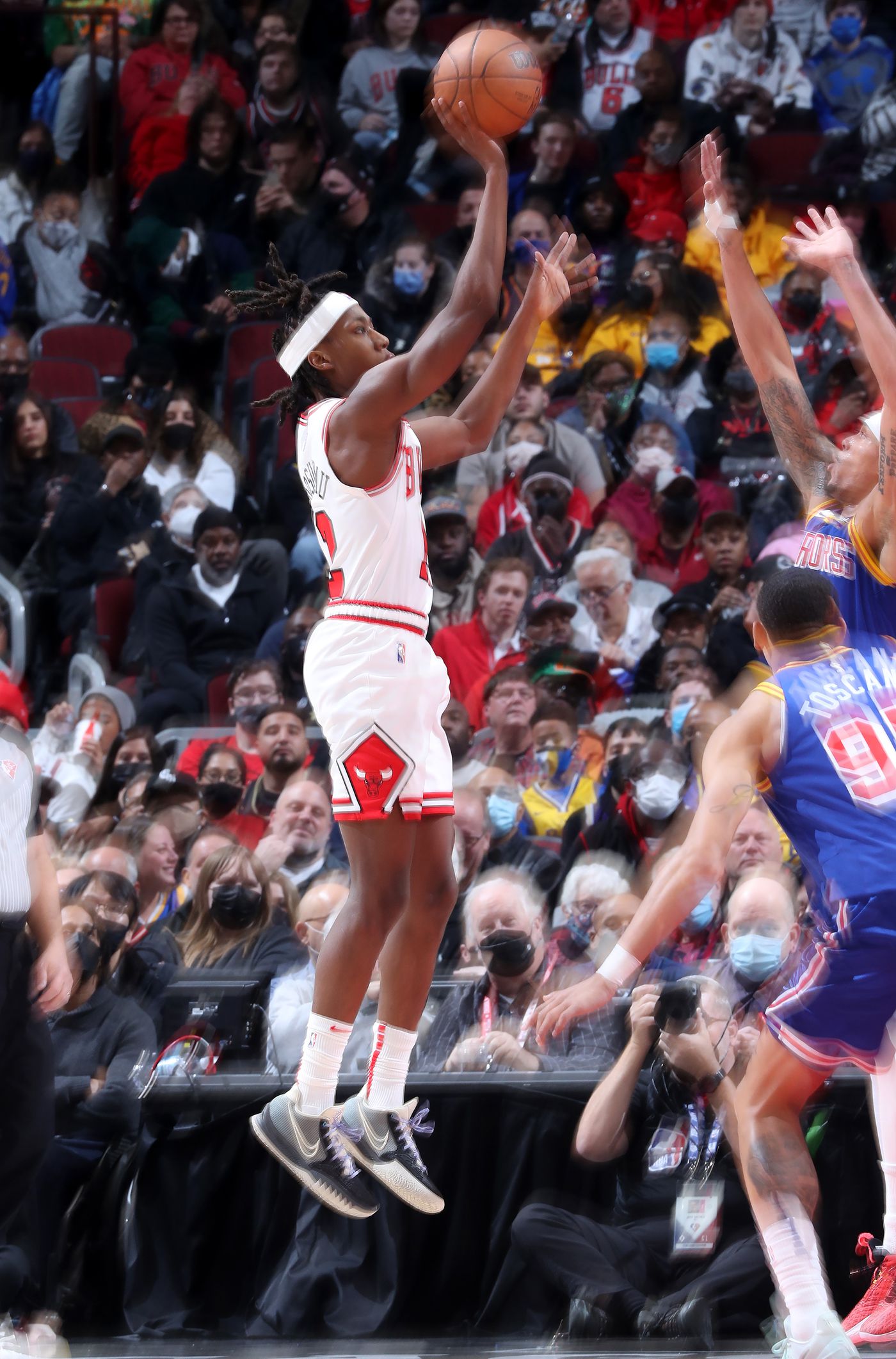 Chicago Bulls guard Ayo Dosunmu (12) aims for the basket in the fourth quarter against the Golden State Warriors at United Center on Jan. 14, 2022, in Chicago.
