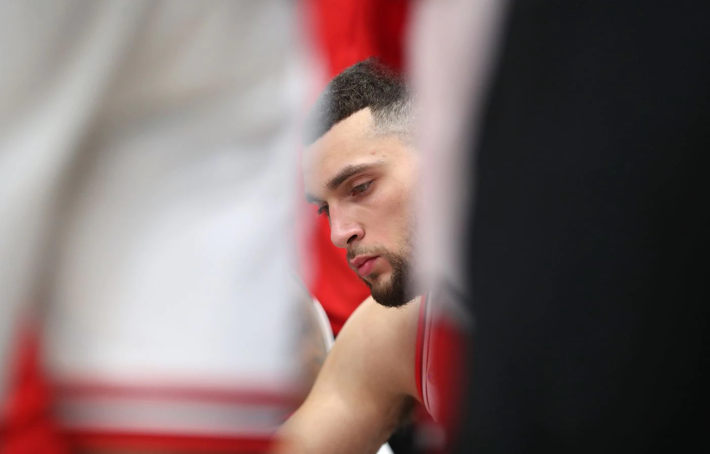 Chicago Bulls guard Zach LaVine (8) sits on the bench during a timeout in the third quarter against the Washington Wizards at United Center on Jan. 7, 2022, in Chicago.