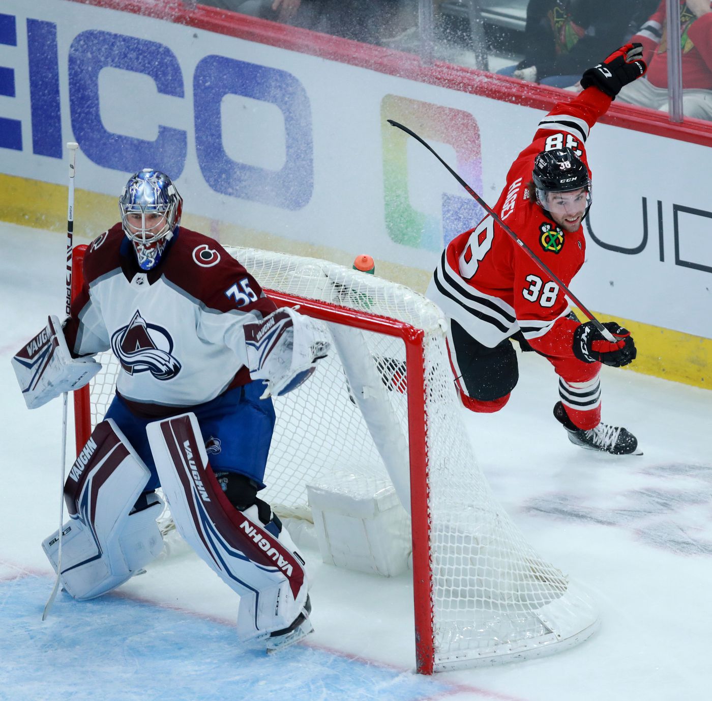 Blackhawks left wing Brandon Hagel (38) passes by Avalanche goaltender Darcy Kuemper (35) while chasing after the puck in the second period.