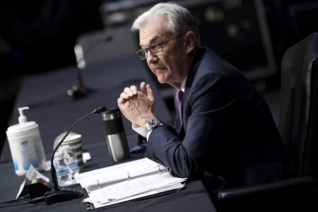 Fed plans to raise rates as soon as March to cool inflation
