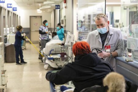 Latest sign of hospitals’ COVID crisis: Patients kept waiting in ERs for beds