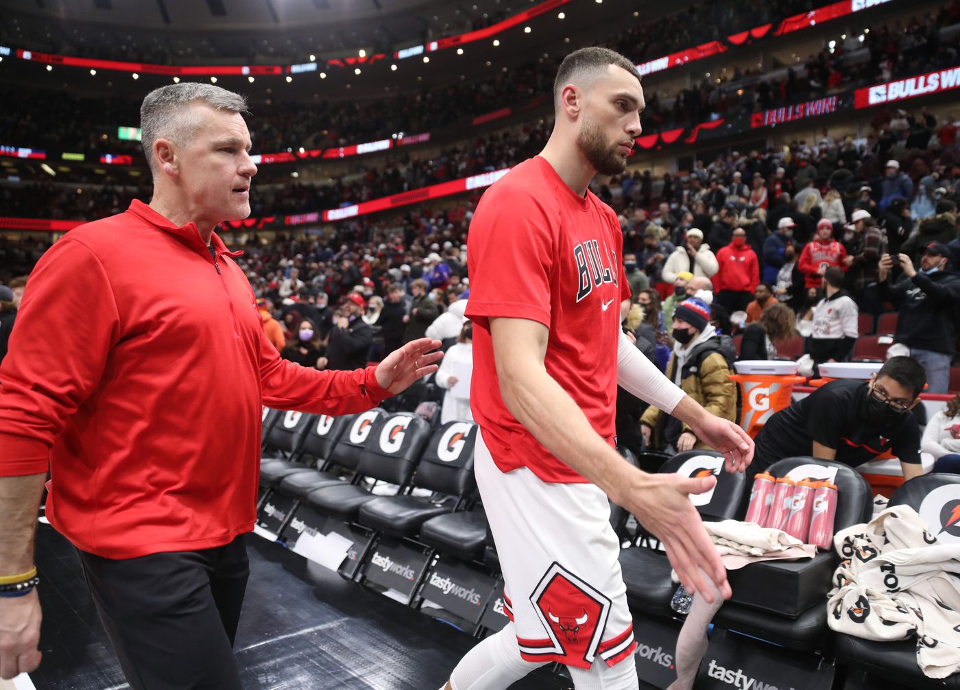 Chicago Bulls head coach Billy Donovan and guard Zach LaVine (8) head to the locker room after a 130-122 win over the Washington Wizards at United Center on Jan. 7, 2022, in Chicago.