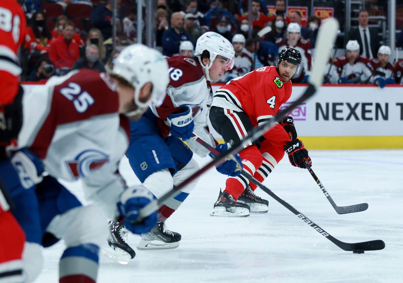 Blackhawks defenseman Seth Jones (4) follows the puck as the Avalanche work down the ice in the first period.