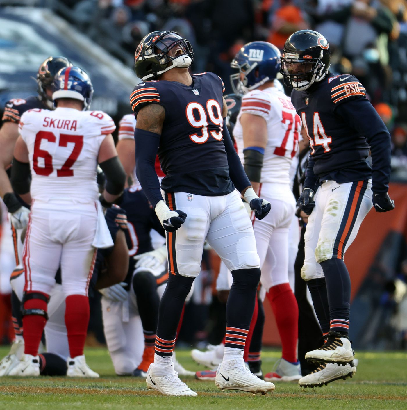 Bears outside linebacker Trevis Gipson celebrates his strip sack of Giants quarterback Mike Glennon in the third quarter on Jan. 2, 2022 at Soldier Field.