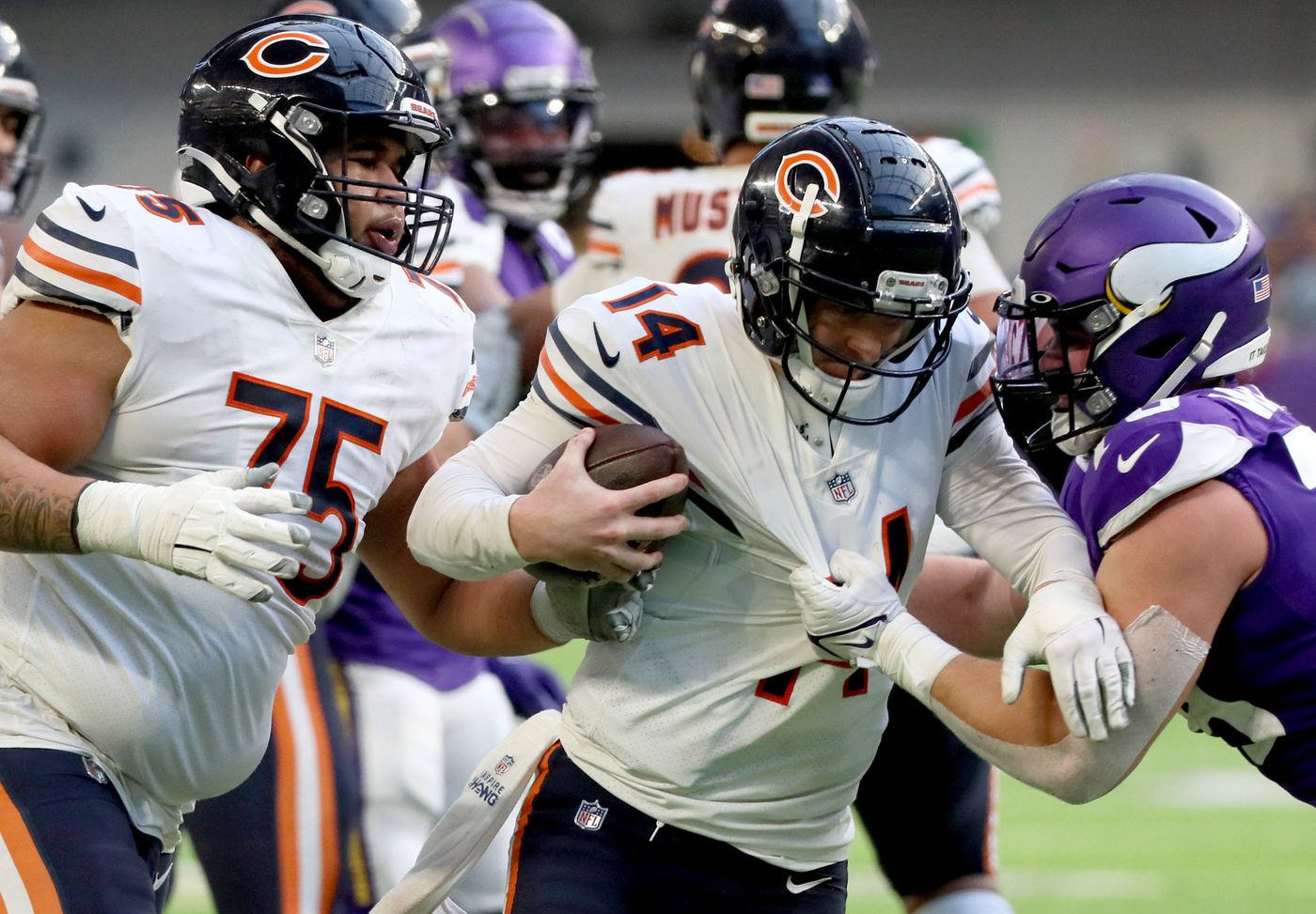 Bears quarterback Andy Dalton is sacked by Vikings defensive end Kenny Willekes on Jan. 9, 2022. Dalton was sacked seven times in the Week 18 loss.