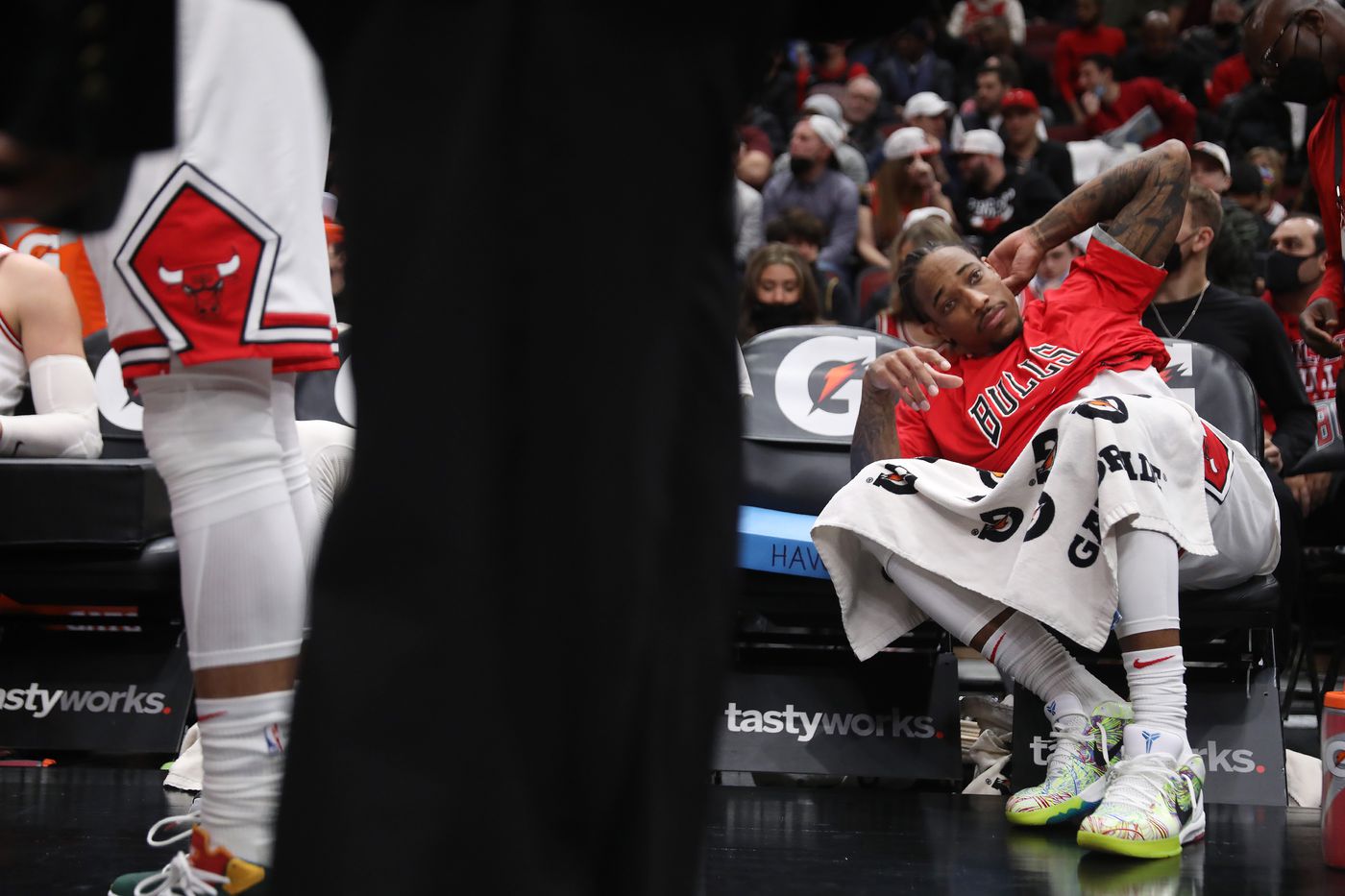 Chicago Bulls guard Ayo Dosunmu (12) rests on the bench during a timeout in the fourth quarter against the Washington Wizards at United Center on Jan. 7, 2022, in Chicago.