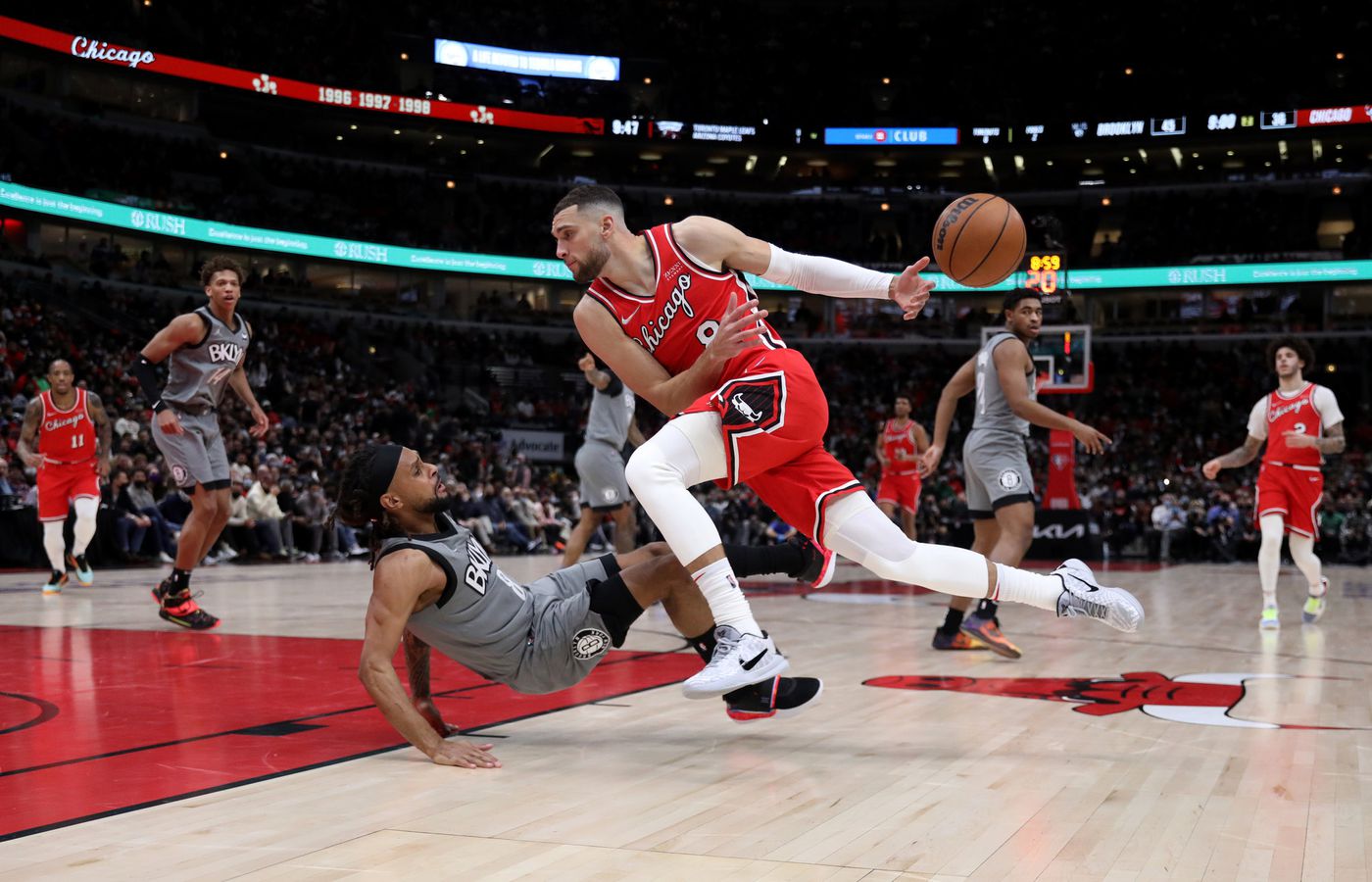 Bulls guard Zach LaVine (8) loses the ball as he drives on Nets guard Patty Mills in the first half.