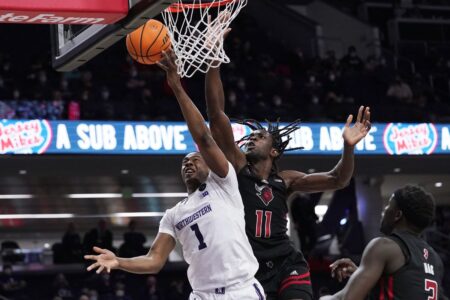 Northwestern beats Rutgers 79-78 in overtime — after losing a 24-point lead in the 2nd half — to end a 4-game losing streak