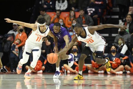 No. 13 Illinois men hold off Northwestern’s late rally for a 73-66 win that keeps them in 1st place in the Big Ten