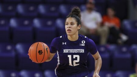 Northwestern women upend No. 4 Michigan 71-69 in double overtime — the highest-ranked team the Wildcats have beaten since 1982