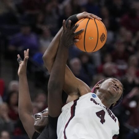 South Carolina tops Louisville 72-59, advances to title game