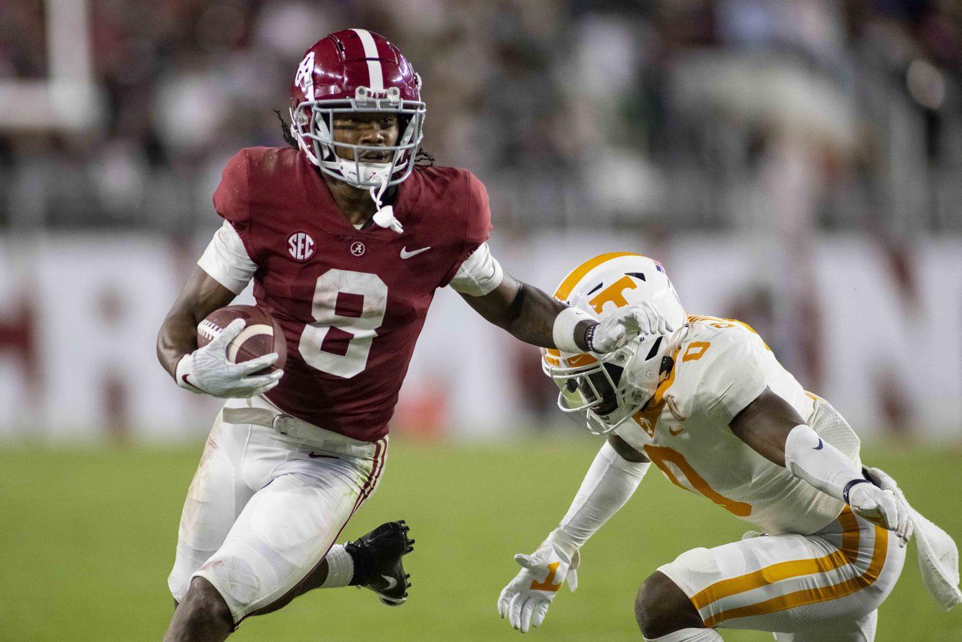 Alabama wide receiver John Metchie III (8) runs past Tennessee defensive back Doneiko Slaughter (0) during the second half, Oct. 23, 2021, in Tuscaloosa, Ala.