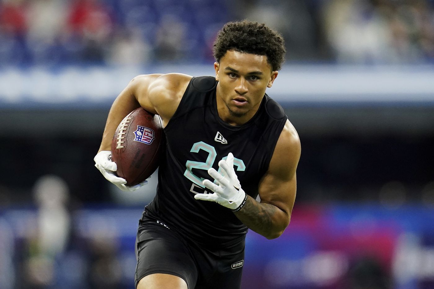 Washington defensive back Trent McDuffie participates in a drill at the NFL scouting combine in Indianapolis, March 6, 2022.