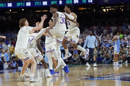 Kansas uses historic rally — the largest in national championship history — to beat North Carolina 72-69 for title