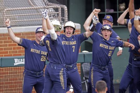 Notre Dame hits 4 home runs in an 8-6 win over No. 1 seed Tennessee in the opener of an NCAA super regional