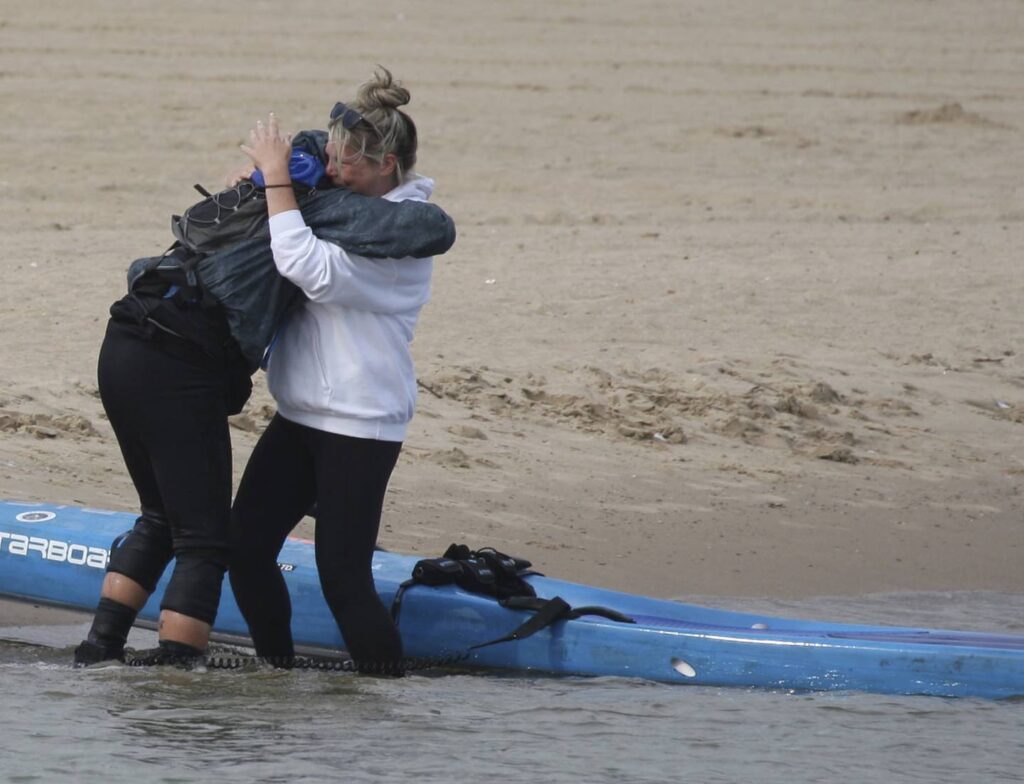 Disabled athlete crosses Lake Michigan on paddleboard in quest to traverse all the Great Lakes: ‘It’s really something to witness’