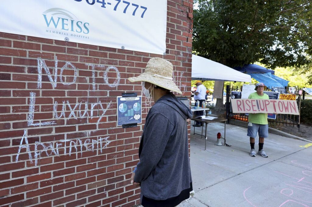 Uptown activists occupy development site for luxury housing, and demand a halt