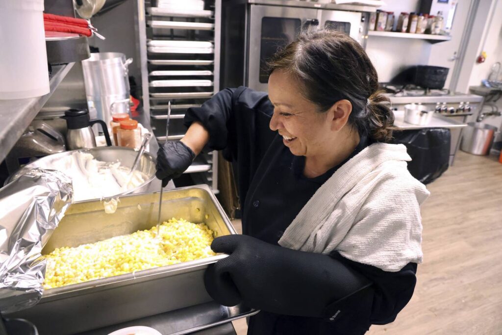 As prices at grocery stores rise, a community dinner in Pilsen helps to feed those in need and unites: ‘We know what it feels like to be hungry’