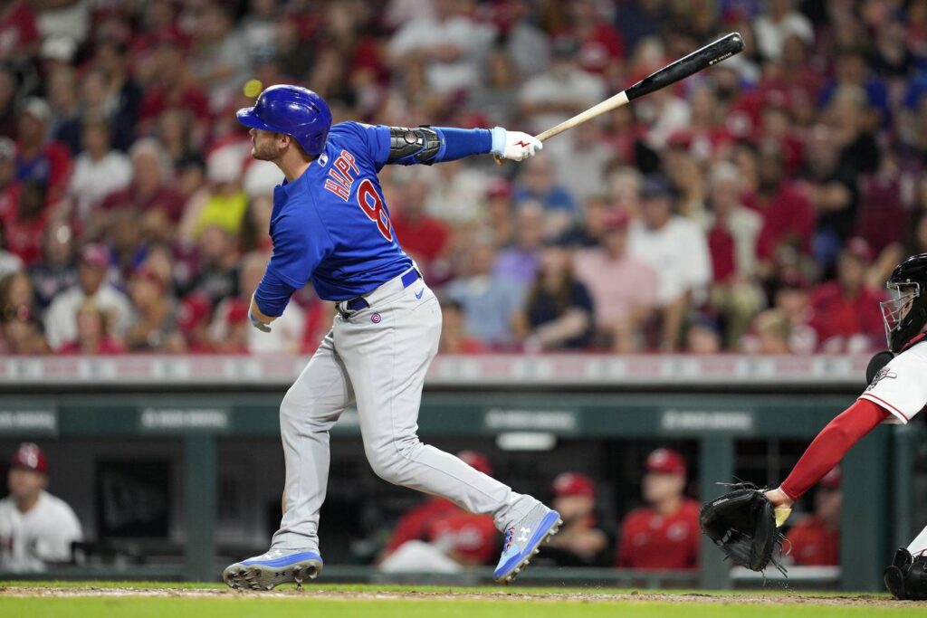 Ian Happ homers and drives in 4, leading the Chicago Cubs to a 7-2 win against the Cincinnati Reds