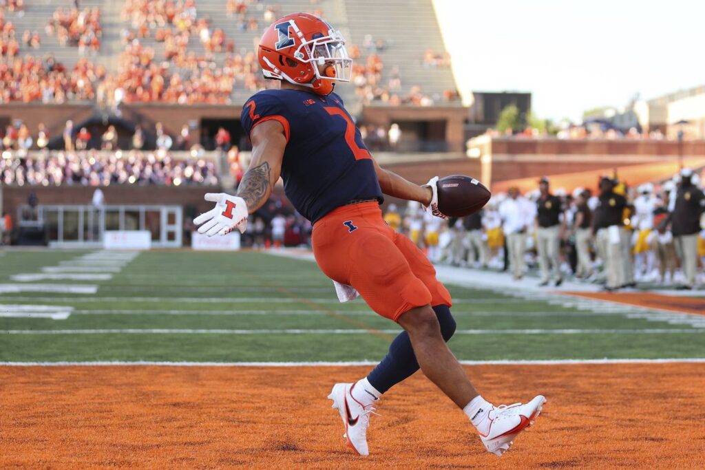 Chase Brown and Tommy DeVito spark Illinois to a season-opening 38-6 rout of Wyoming