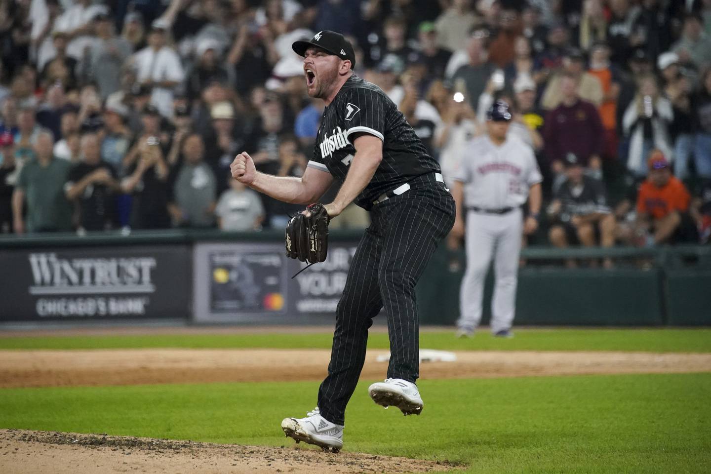 White Sox closer Liam Hendriks yells after the final out in a win against the Astros on Aug. 16, 2022, at Guaranteed Rate Field. 
