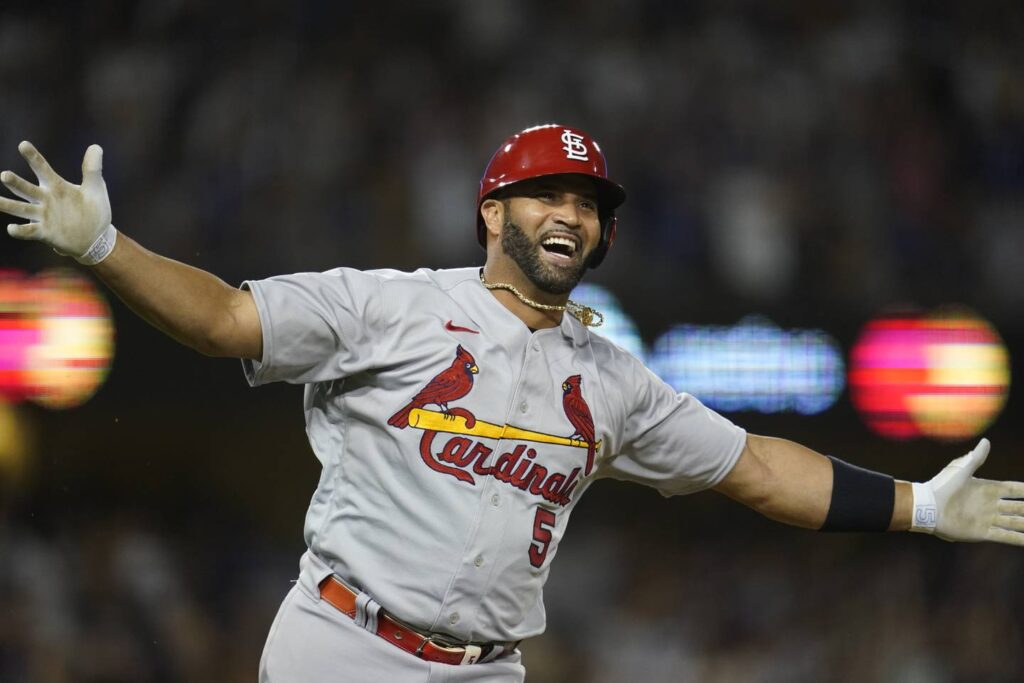 Albert Pujols hits his 700th home run, becoming the 4th player in major-league history to reach milestone