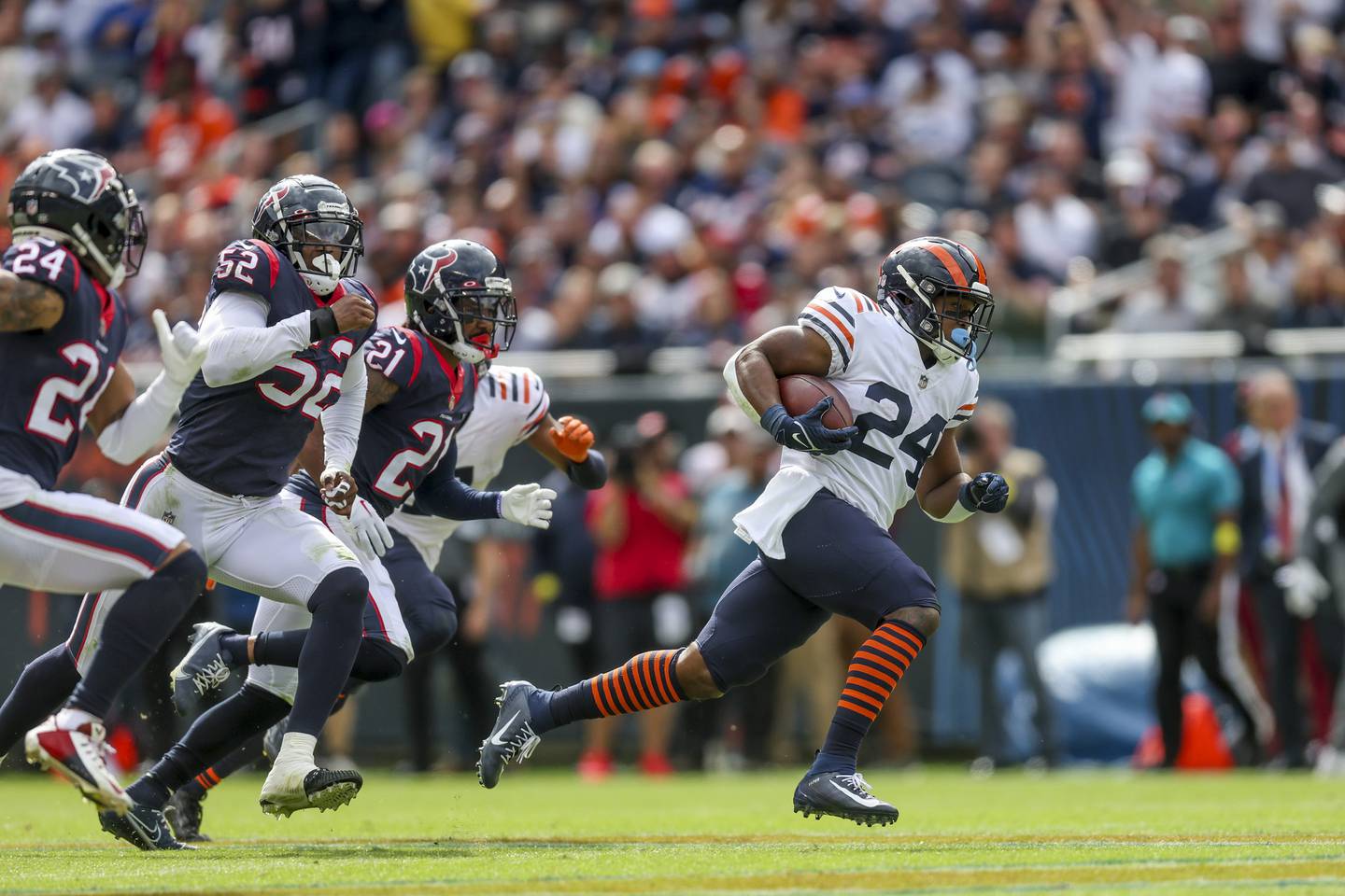 The Bears' Khalil Herbert breaks off a 52-yard run the third quarter against the Texans on Sunday at Soldier Field. 