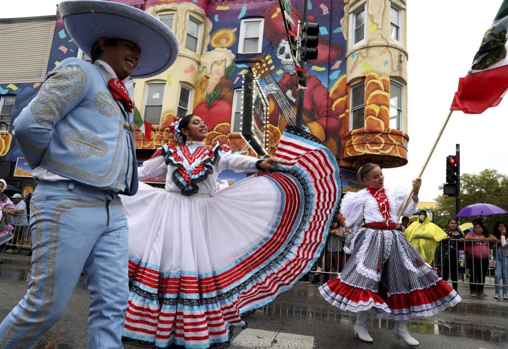 Downpour can’t dampen spirits as Little Village celebrates Mexican Independence Day with a lively parade