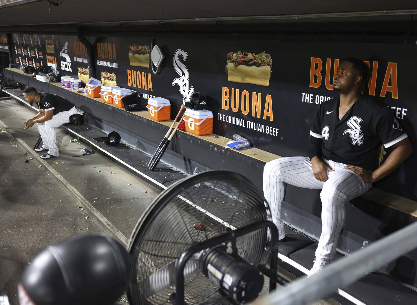 White Sox players Eloy Jiménez, right, and José Abreu sit on the bench after a loss to the Guardians on Sept. 21, 2022, at Guaranteed Rate Field.
