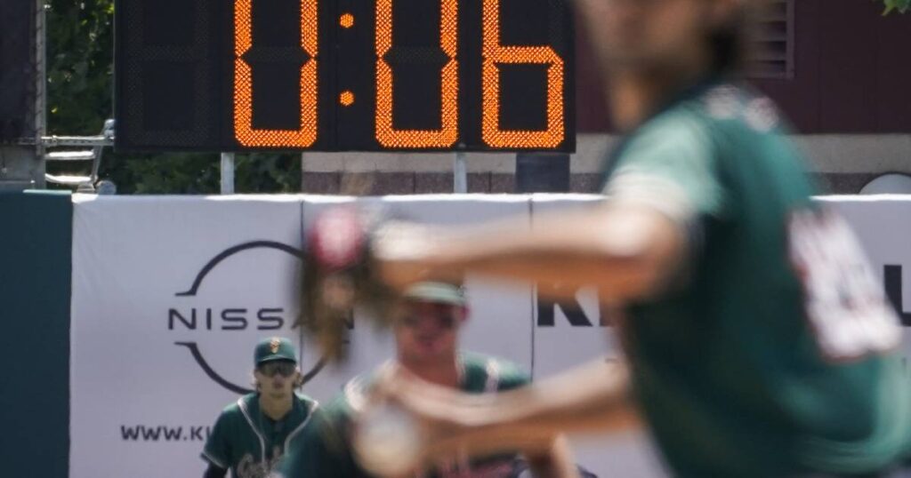 MLB adopts pitch clock, defensive shift limits and bigger bases for the 2023 season