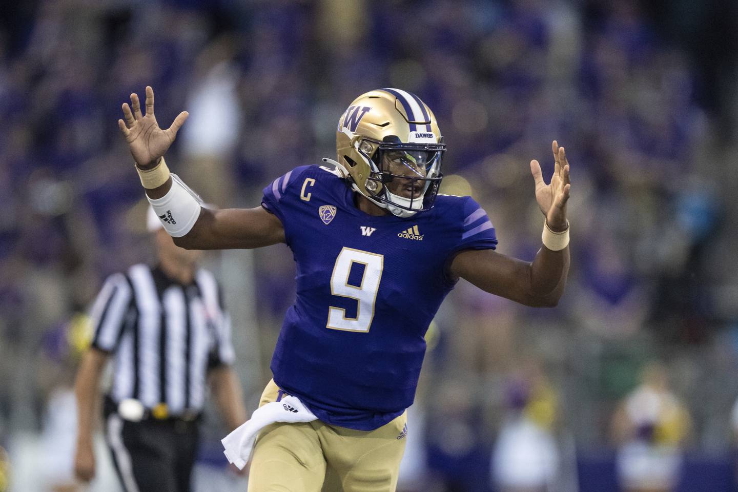 Washington quarterback Michael Penix Jr. celebrates a touchdown against Kent State during a game Sept. 3.