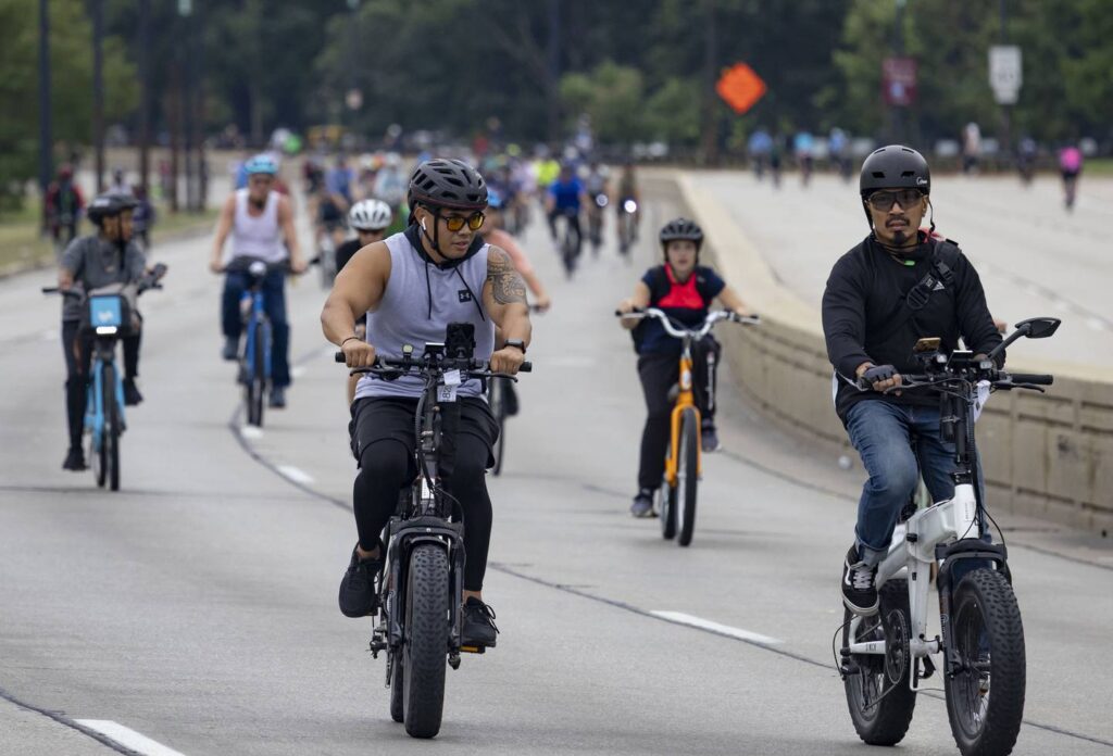 Bike the Drive sees growing number of e-bikes; riders say motorized assistance helps them enjoy the road