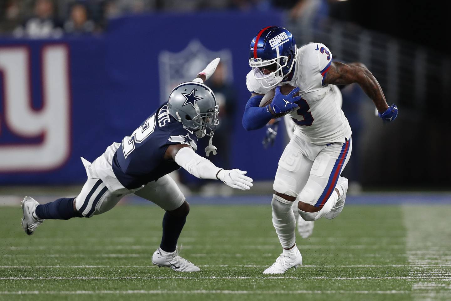 Giants wide receiver Sterling Shepard attempts to evade a tackle during a game on Sept. 26, 2022.