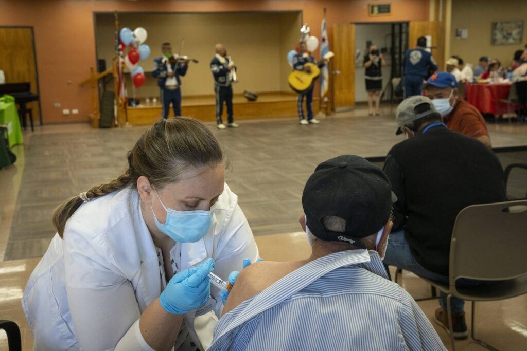 Chicago and suburbs reach low risk level for COVID-19 as new cases, hospitalizations decline