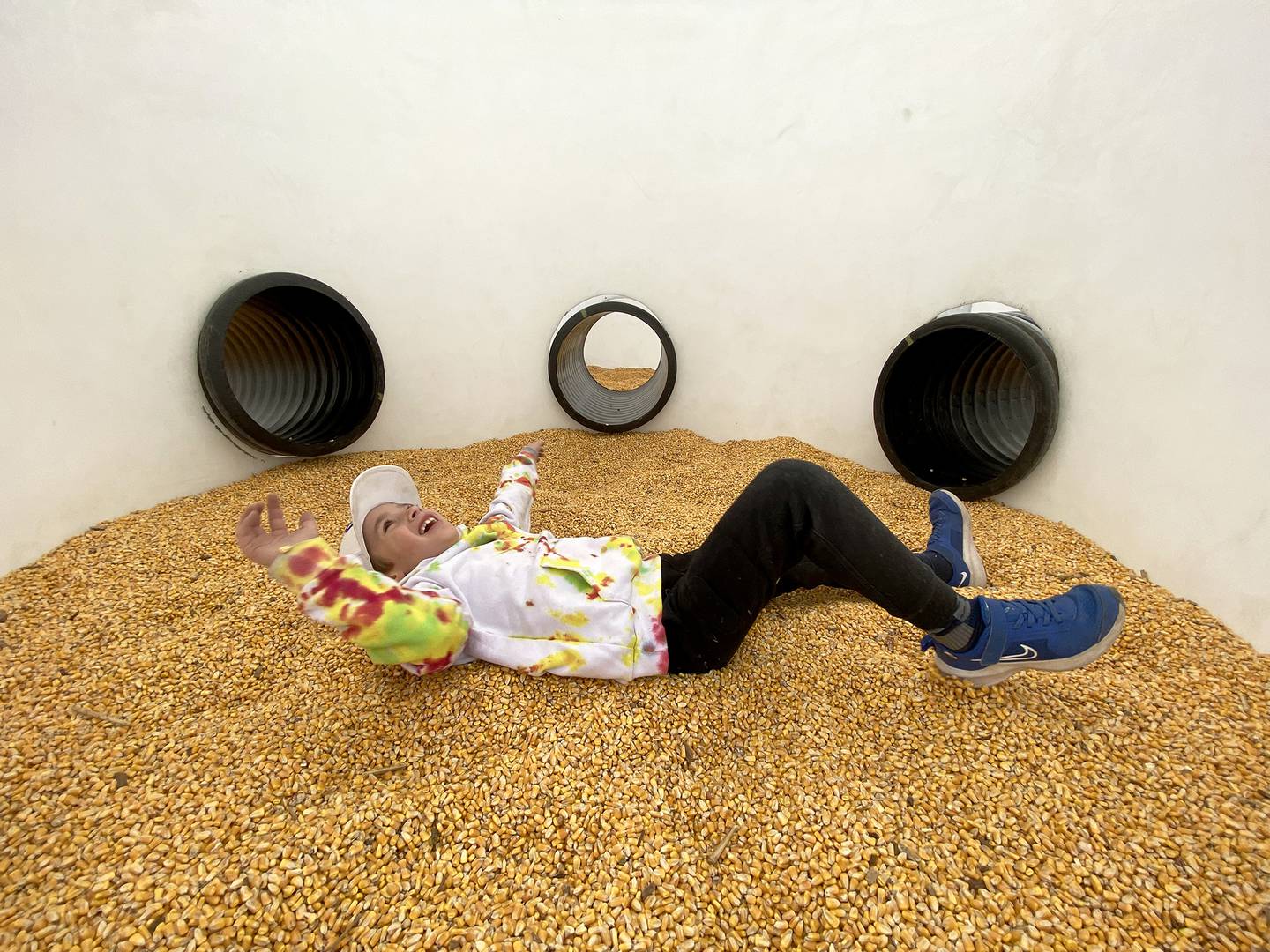 Boone Finley plays in a corn bin made from a water storage tank on Sept. 23, 2022, at Heap's Giant Pumpkin Farm, 4853 Route 52, in Minooka.