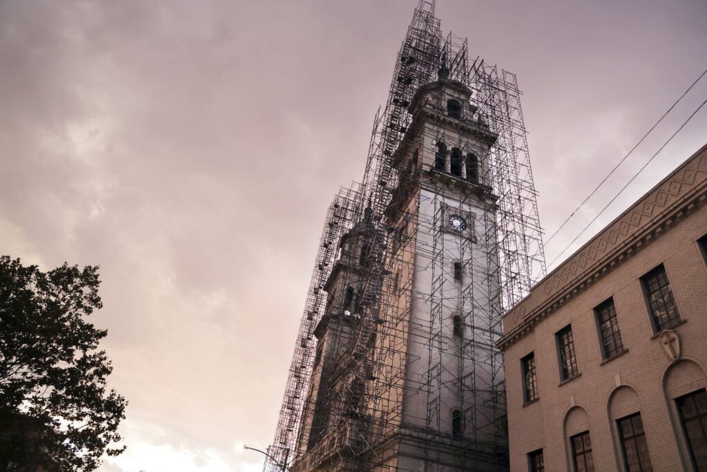 On 108th anniversary, St. Adalbert’s parishioners challenge removal of La Pieta sculpture from shuttered Pilsen church: ‘I really think that God is here’