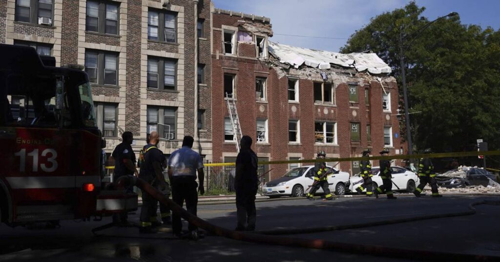 Building collapses on West Side after explosion, officials say
