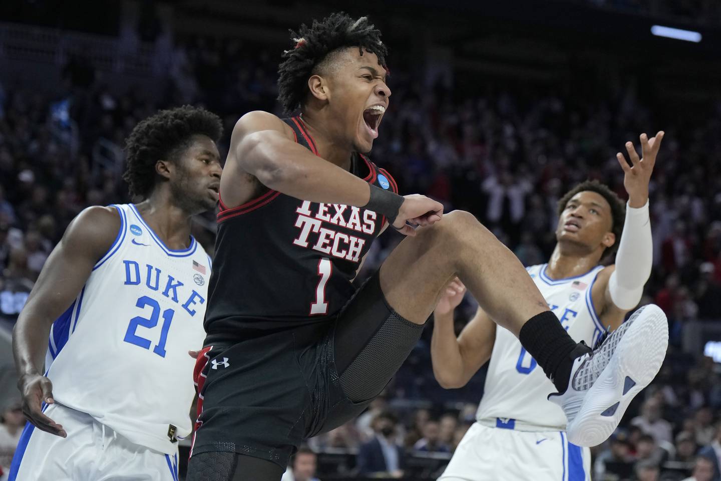 Texas Tech guard Terrence Shannon Jr. (1) reacts after dunking against Duke during the first half of an NCAA Tournament Sweet 16 game in San Francisco, March 24, 2022.