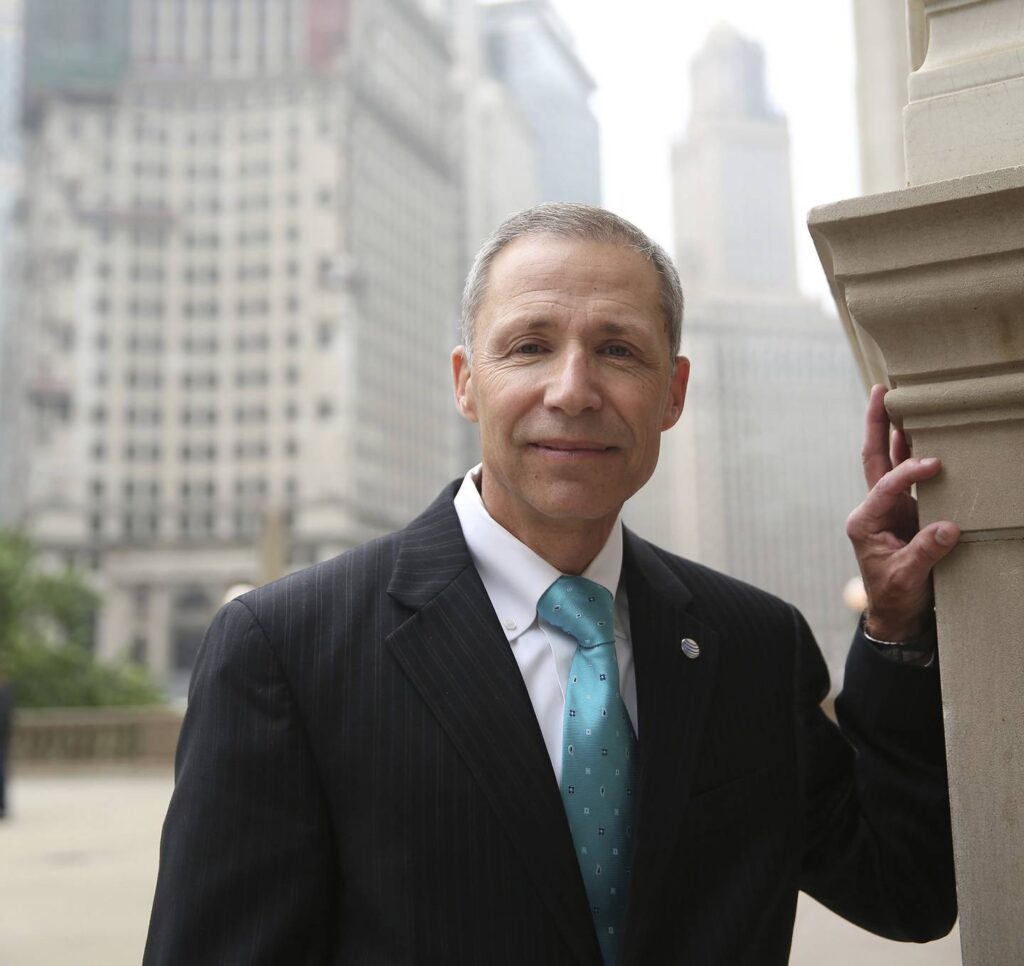 Former AT&T Illinois president pleads not guilty in alleged scheme to sway House Speaker Michael Madigan, while company confirms cooperation deal
