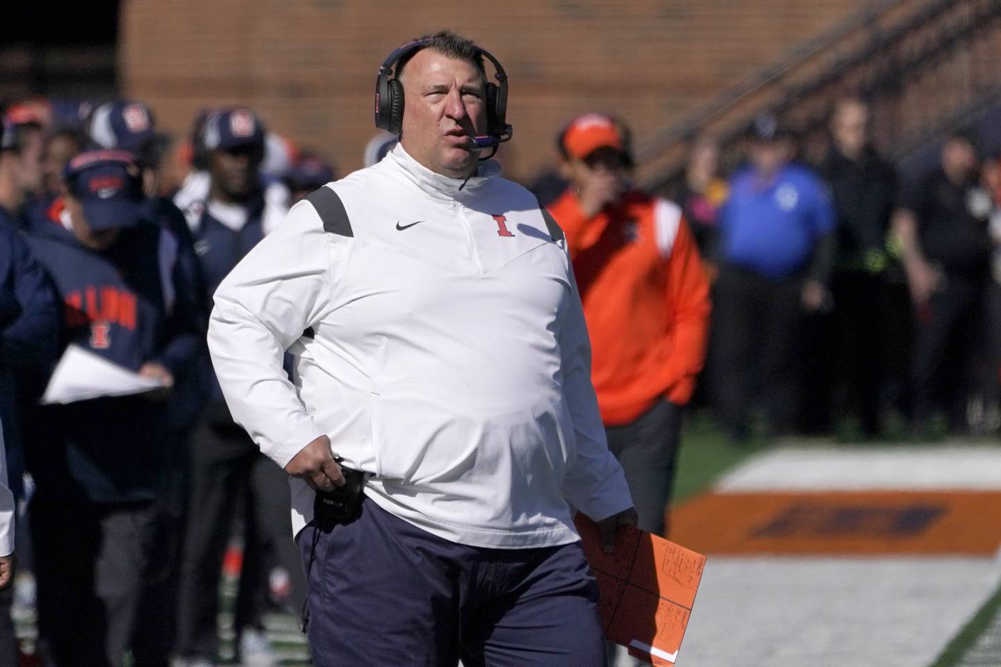 Illinois coach Bret Bielema looks at the scoreboard during a game against Minnesota on Oct. 15, 2022.