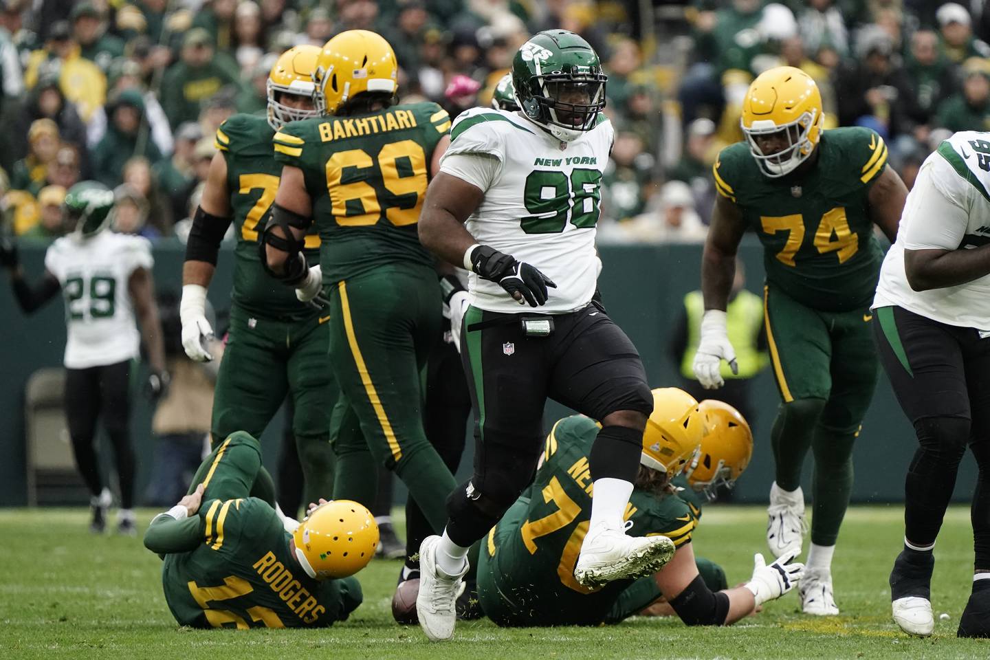 Jets defensive tackle Sheldon Rankins (98) celebrates after sacking Packers quarterback Aaron Rodgers during the first half Sunday, Oct. 16, 2022, in Green Bay.