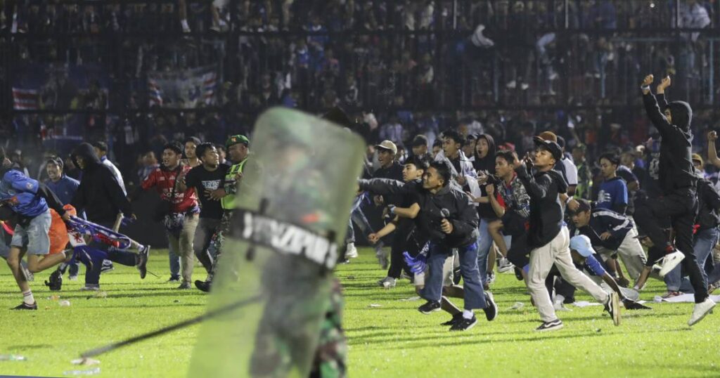 At least 129 dead and scores more injured after a riot breaks out at a soccer match in Indonesia