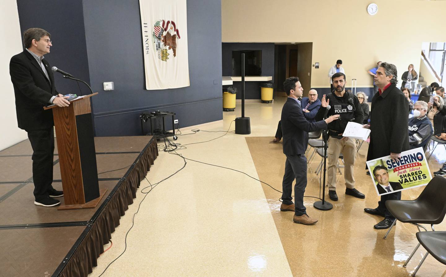 Republican challenger Joseph Severino, right, was asked to leave after trying to debate U.S. Rep. Brad Schneider during a non-campaign town hall by the congressman at the Vernon Township Community Center on Oct. 15, 2022. 