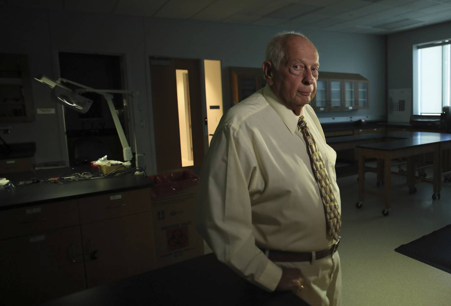 Stephen Warlen, shown in August in the Kansas City police crime lab, processed evidence in Raymond West's murder as a forensic specialist for the department. 