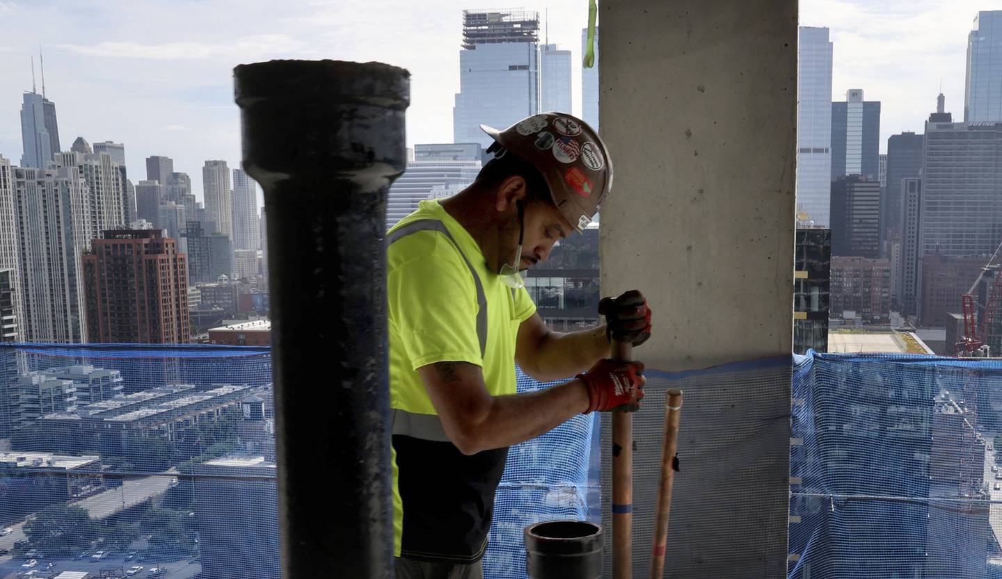 People work at Fulton Market’s newest mixed-use development, the 900 Randolph building.