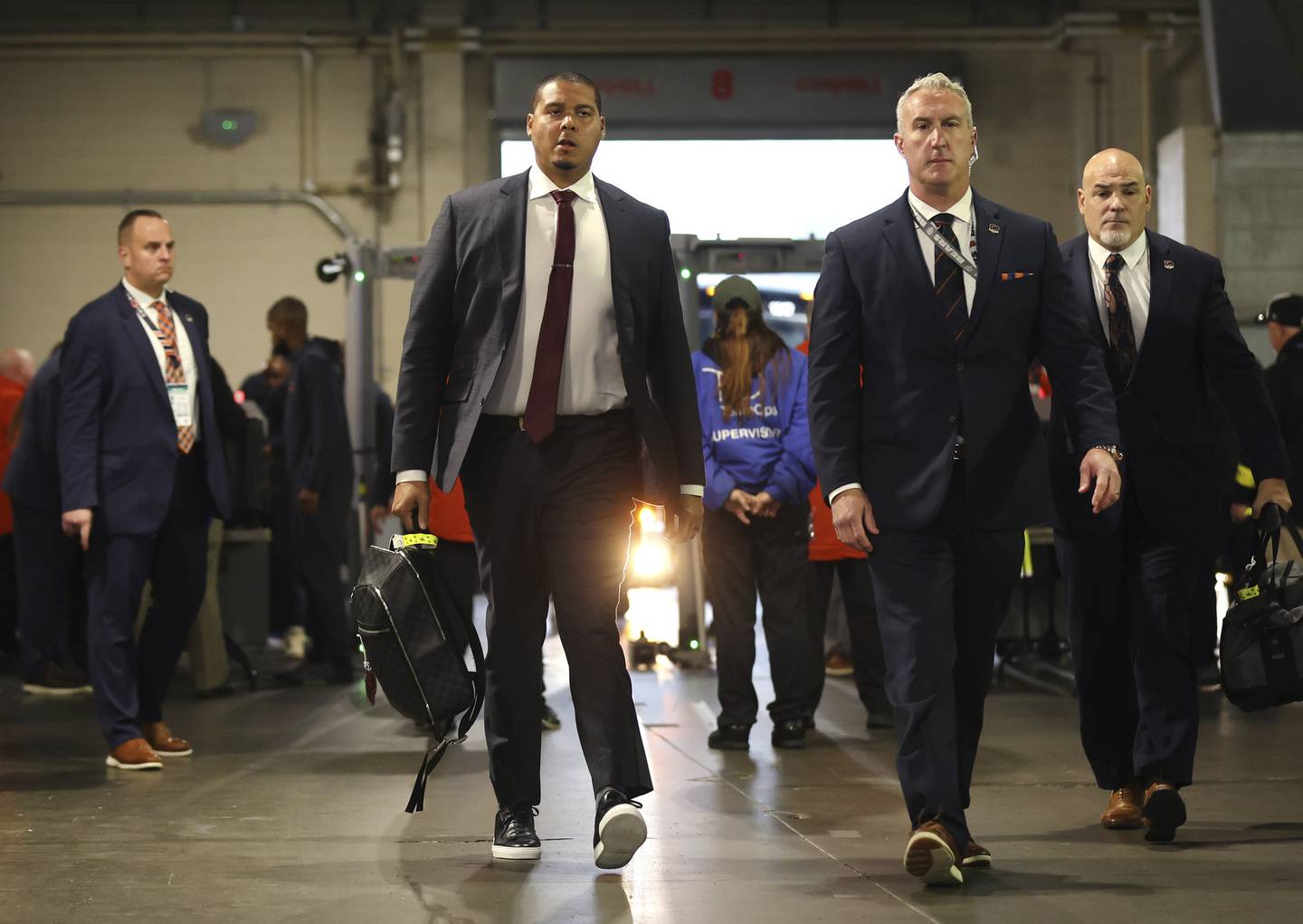 Bears GM Ryan Poles walks to the locker room following team buses arriving for a game against the Patriots at Gillette Stadium on Oct. 24, 2022.