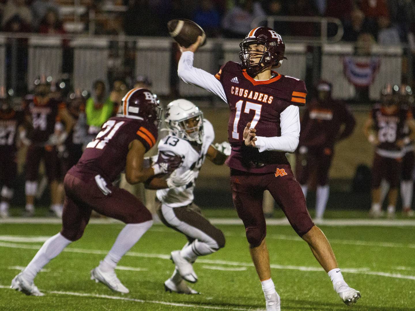 Brother Rice quarterback Ryan Hartz (17) throws a pass against Mount Carmel during a CCL/ESCC Blue game in Chicago on Friday, Sept. 30, 2022.