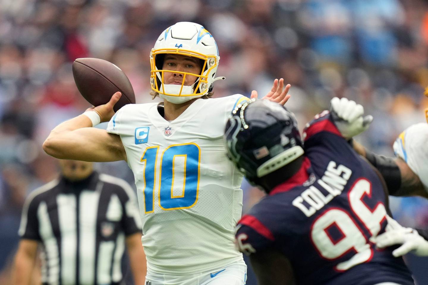Chargers quarterback Justin Herbert throws a pass during the first half of their game against the Texans on Sunday in Houston. 