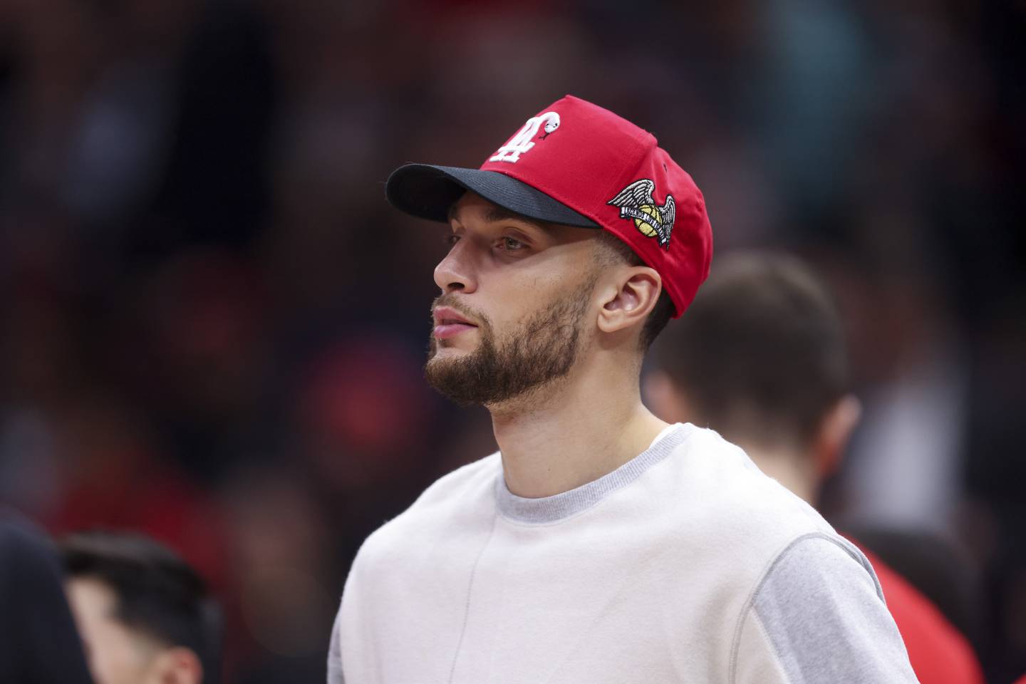 Bulls guard Zach LaVine walks on the court during the second half against the Bucks on Tuesday at the United Center. LaVine, who had left knee surgery in the offseason, didn't play in the final preseason game. 