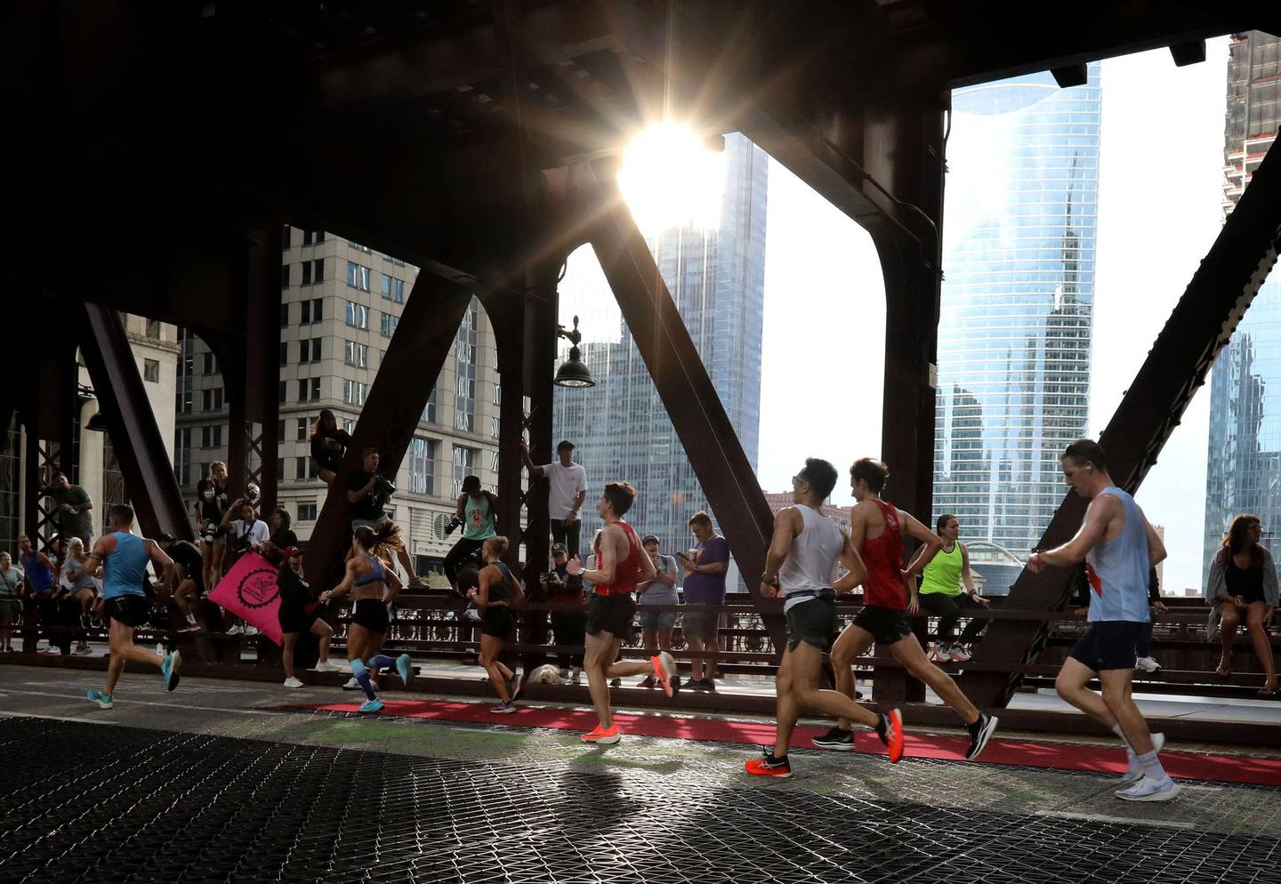 Chicago Marathon runners on the Wells Street Bridge on Oct. 10, 2021.
